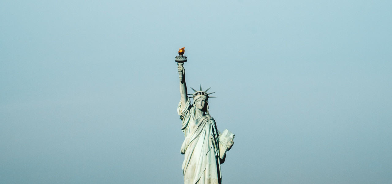 Lady liberty shining a torch for freedom